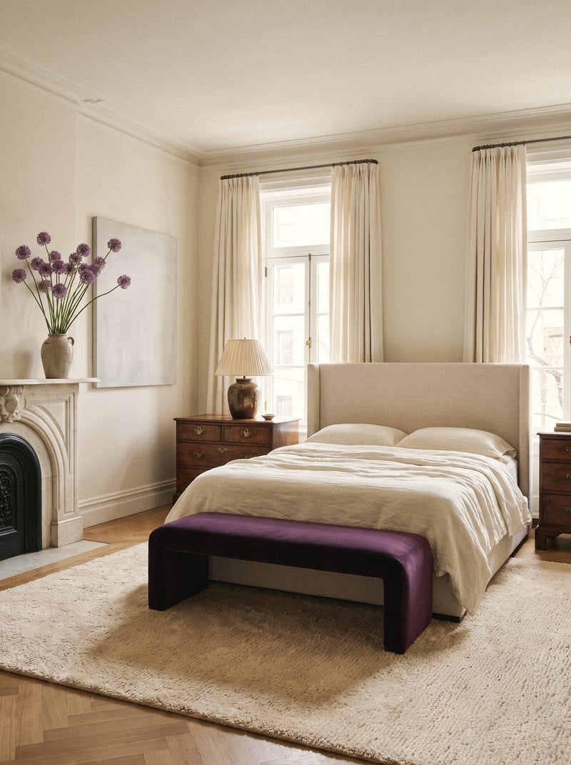 Article 611 ivory solid cashmere handwoven rug in a bedroom