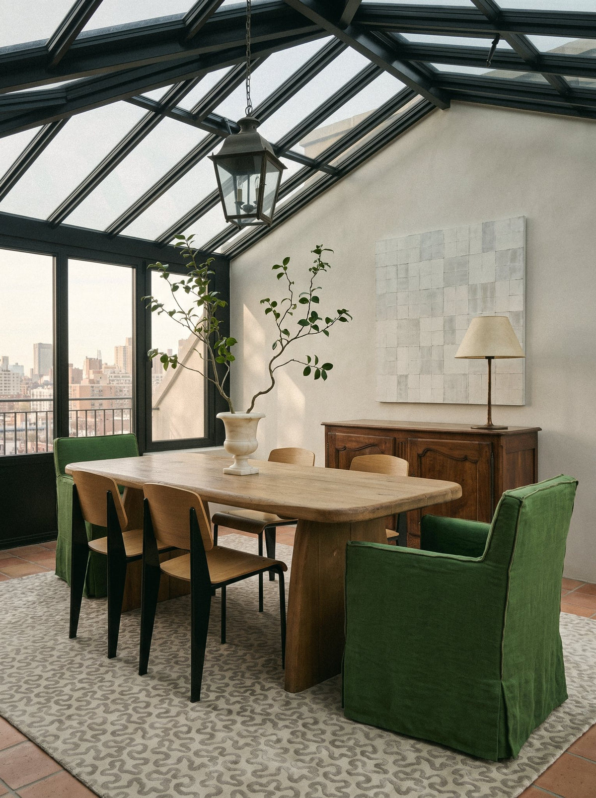 Article 641 sage squiggle cashmere and silk hand-knotted rug in a conservatory dining room