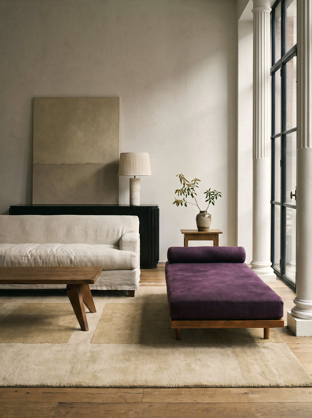 Article 242 camel color block merino wool hand-knotted rug in a loft sitting room