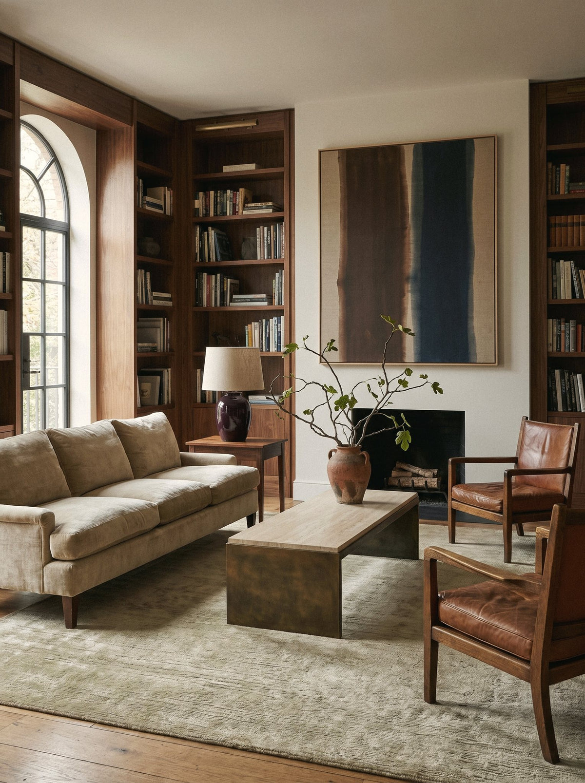 Article 522 sage distressed silk hand-loomed rug in a paneled library