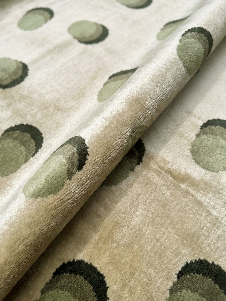 Article 542 sage dot silk hand-knotted rug folded back to show pile depth and texture